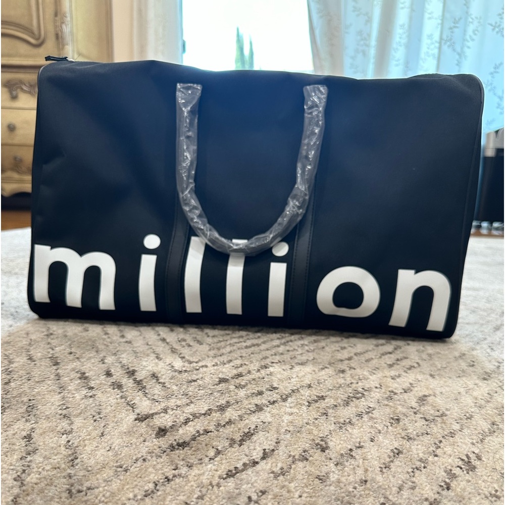 Paco rabanne 1 million black duffel bag. NWT.